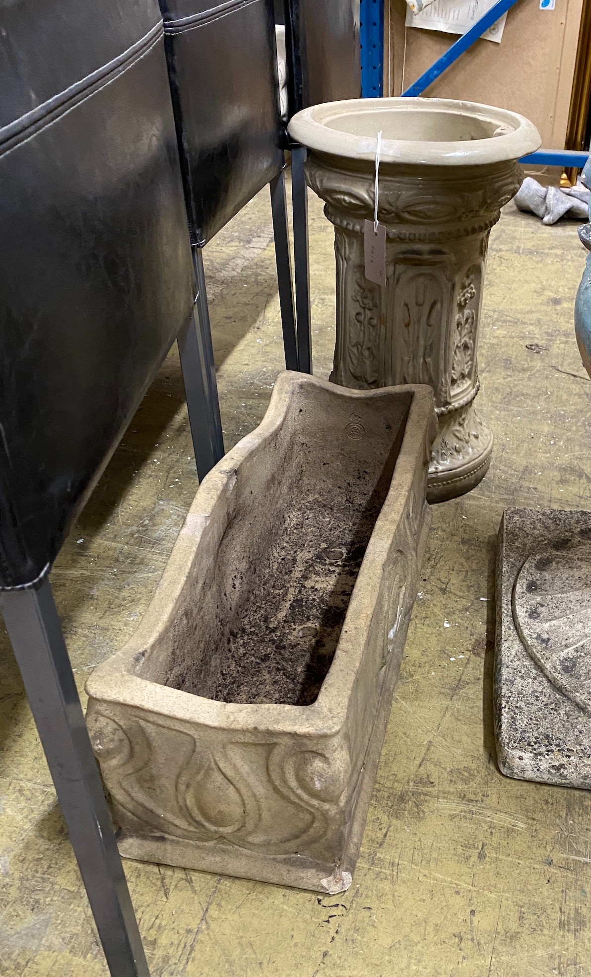 A Doulton Victorian earthenware water filter section, height 46cm together with a stone garden planter